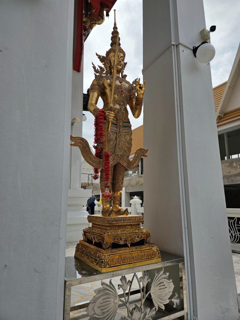 A statue of Buddha in Wat That Thong. Wat That Thong was created about 100 years ago, when two older temples were demolished for city improvement. The new temple stands where the old temples once were.