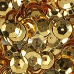6030501-a-close-view-of-new-gold-sequins-used-for-arts-and-crafts